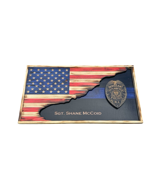 Custom wooden American flag with engraved badge and personalized thin line design