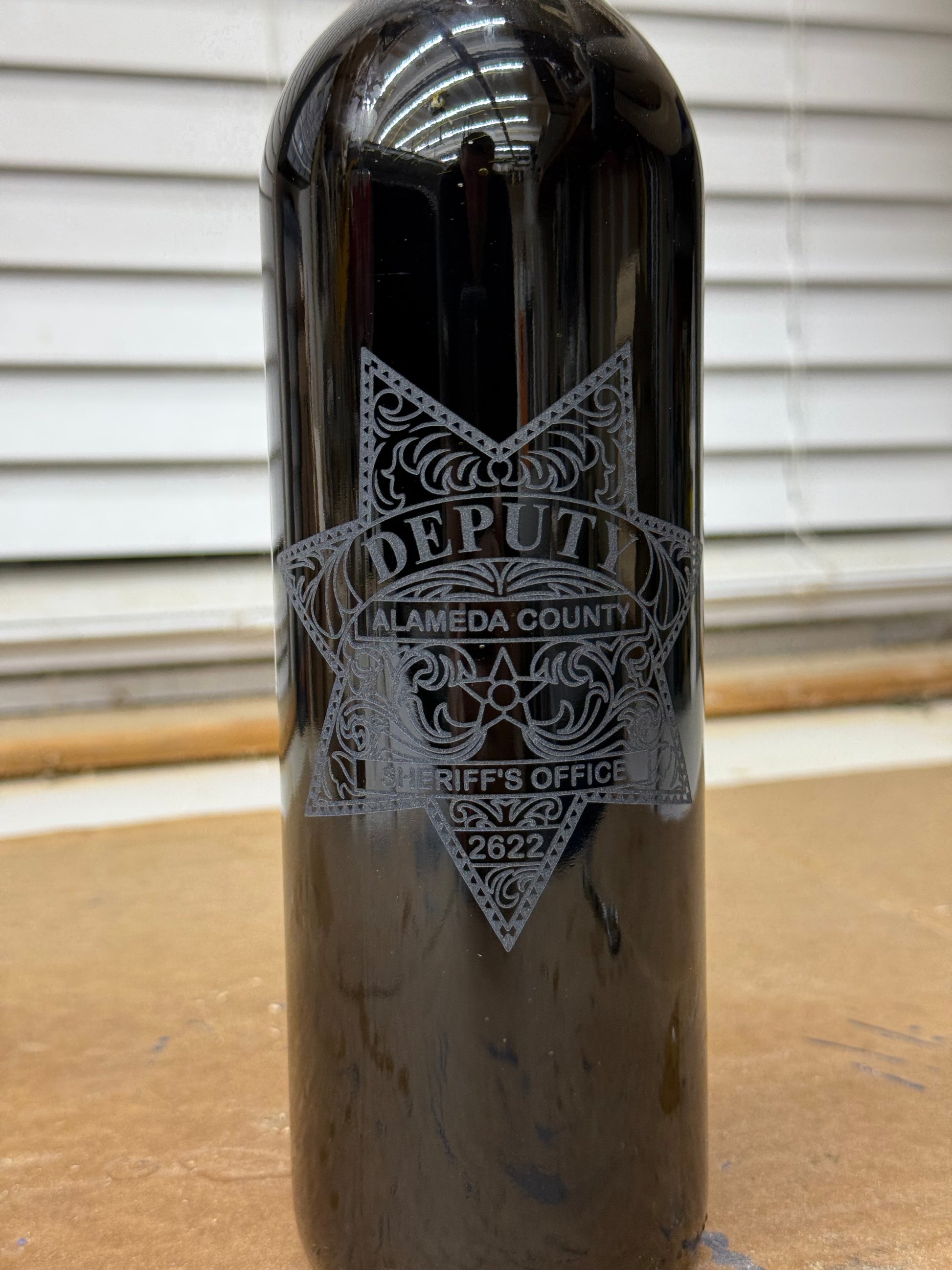 wine bottle with a custom laser engraved personalized message gift