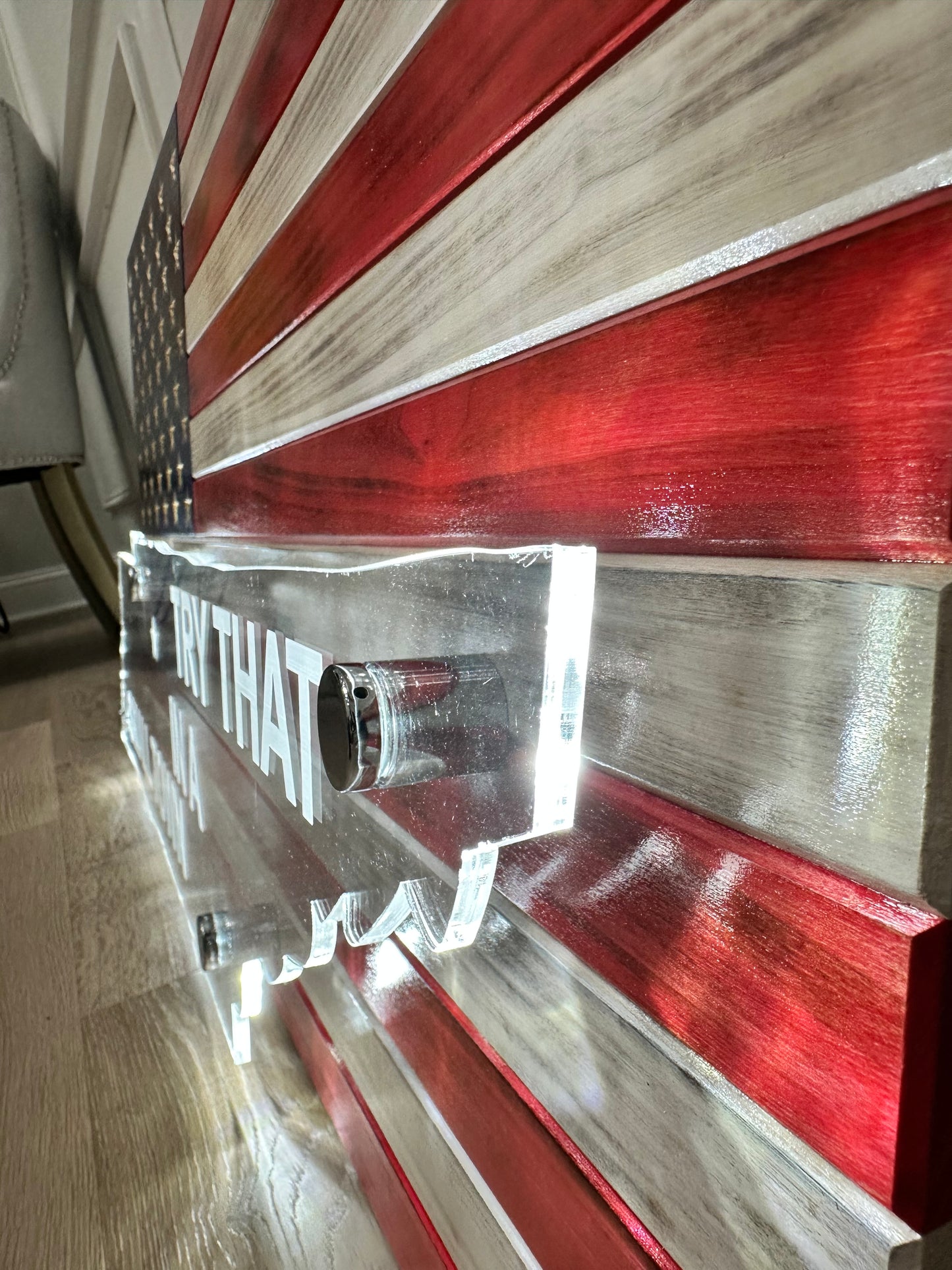 wooden american flag with acrylic cut out of a state and back lit with led lights