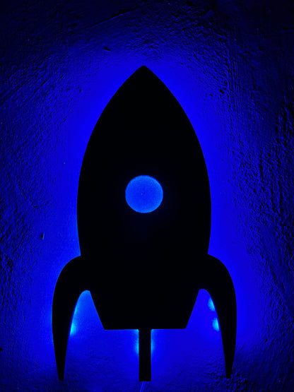 woden rocket cutout with led lighting wall art