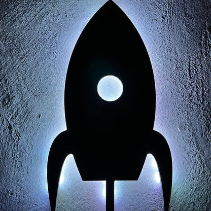 woden rocket cutout with led lighting wall art