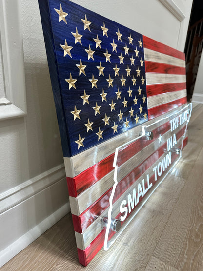 side view of wooden american flag with acrylic cut out of a state and back lit with led lights