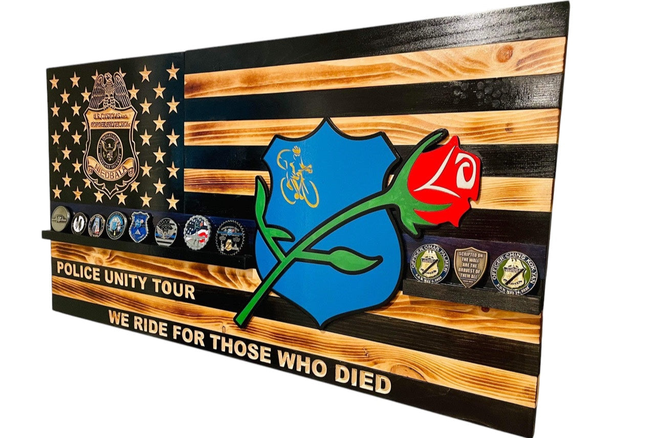 thin blue line american flag with one challenge coin shlef and unity bike tour logo