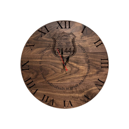 walnut wooden clock with a custom engraving