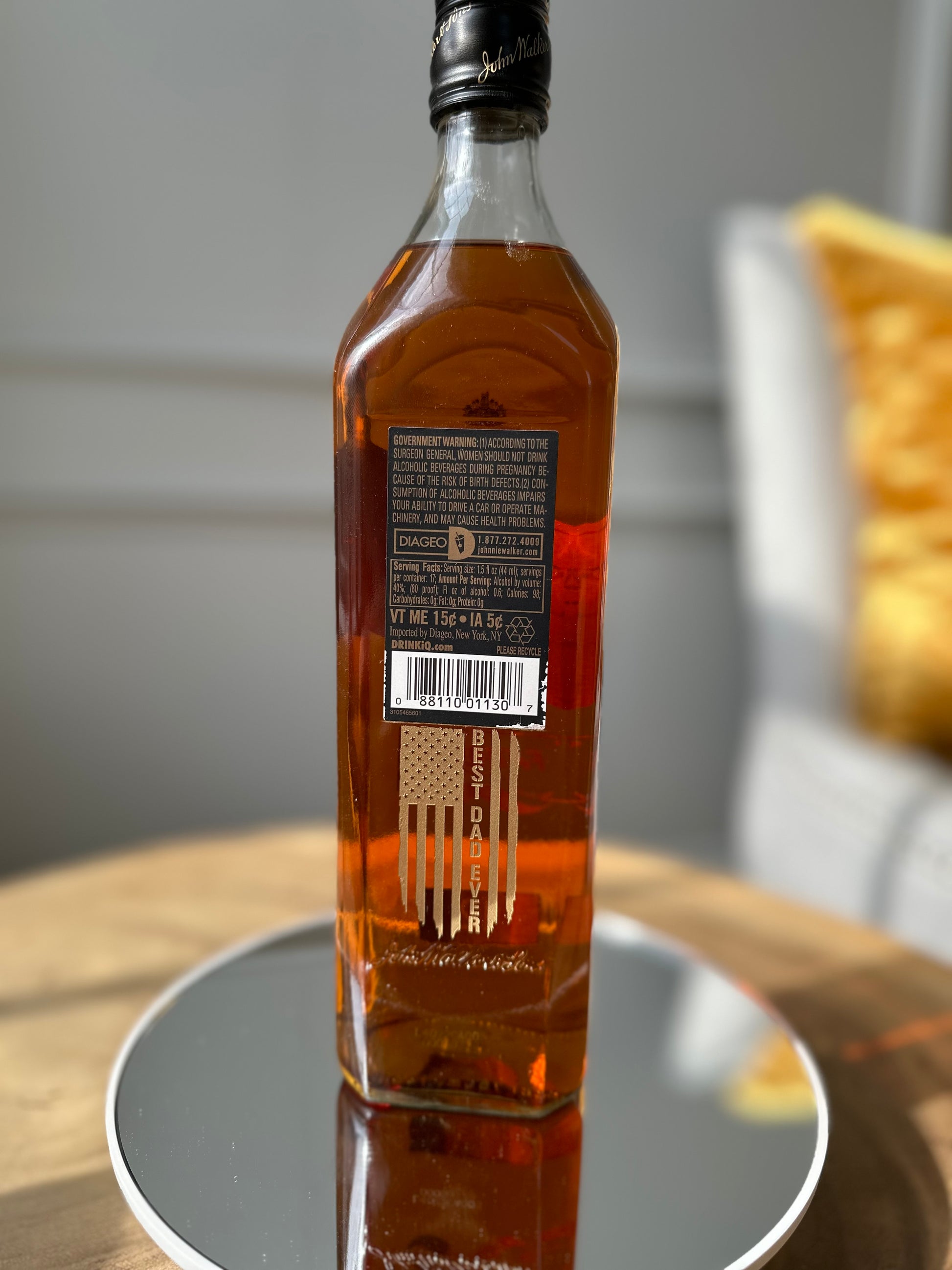 whiskey bottle with custom engraving of american flag and personalization retirement gift