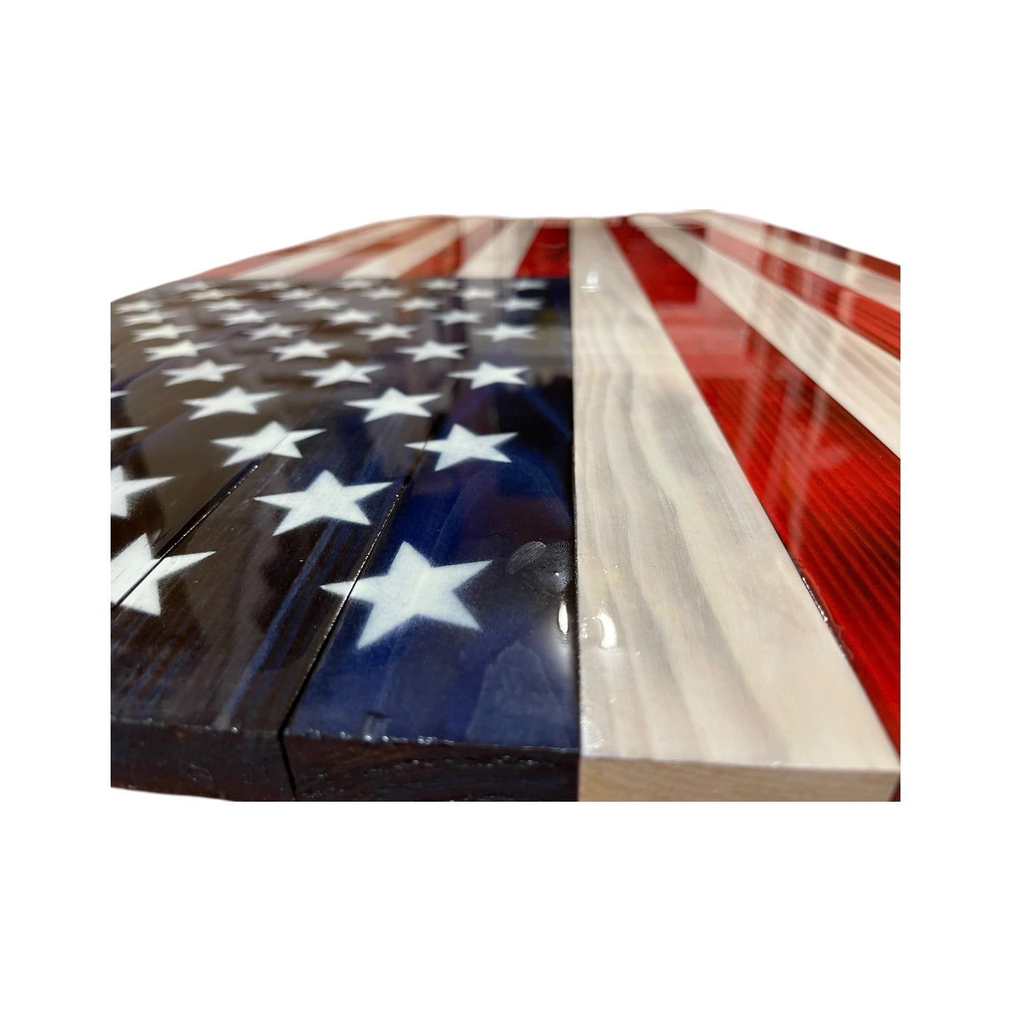 side view of red white and blue american flag covered in epoxy