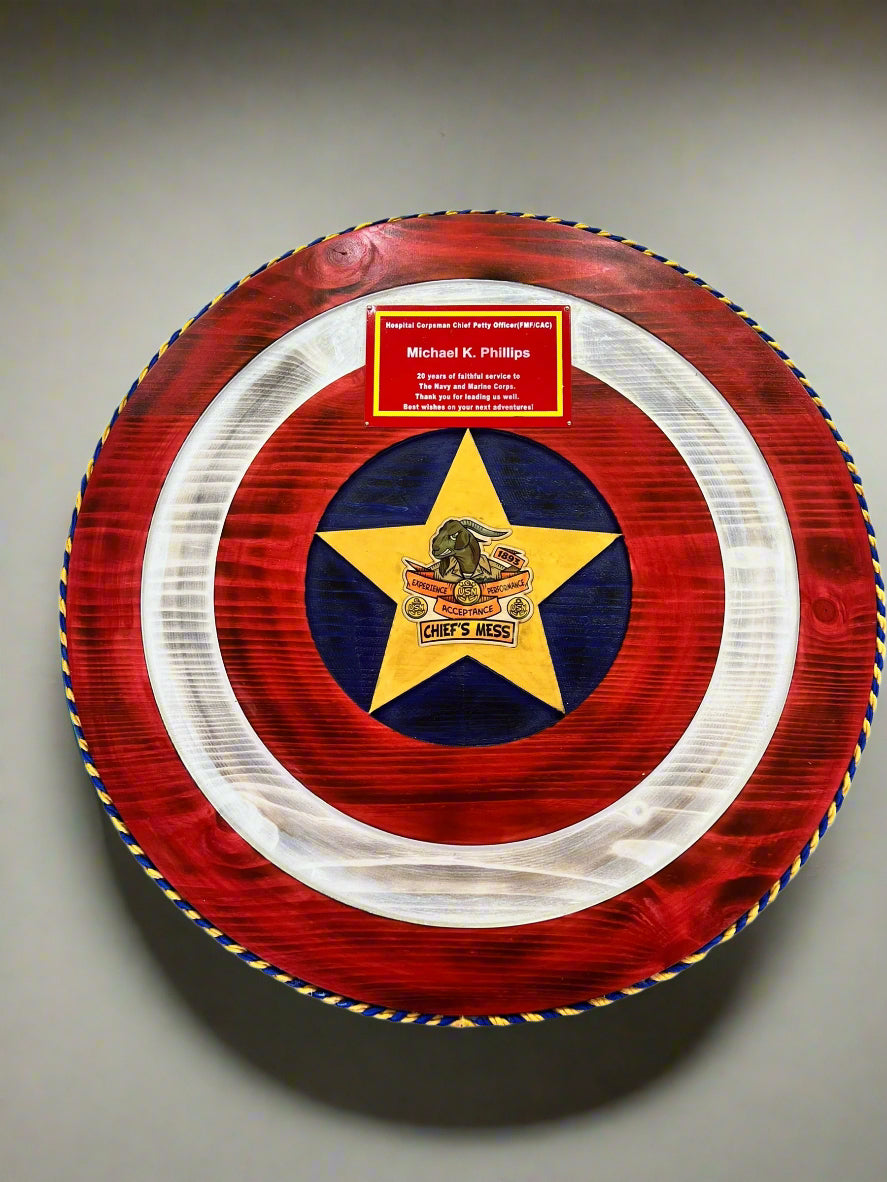 captain america shield with a custom logo inlay and a custom name plate