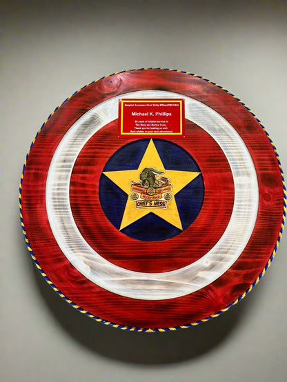 captain america shield with a custom logo inlay and a custom name plate