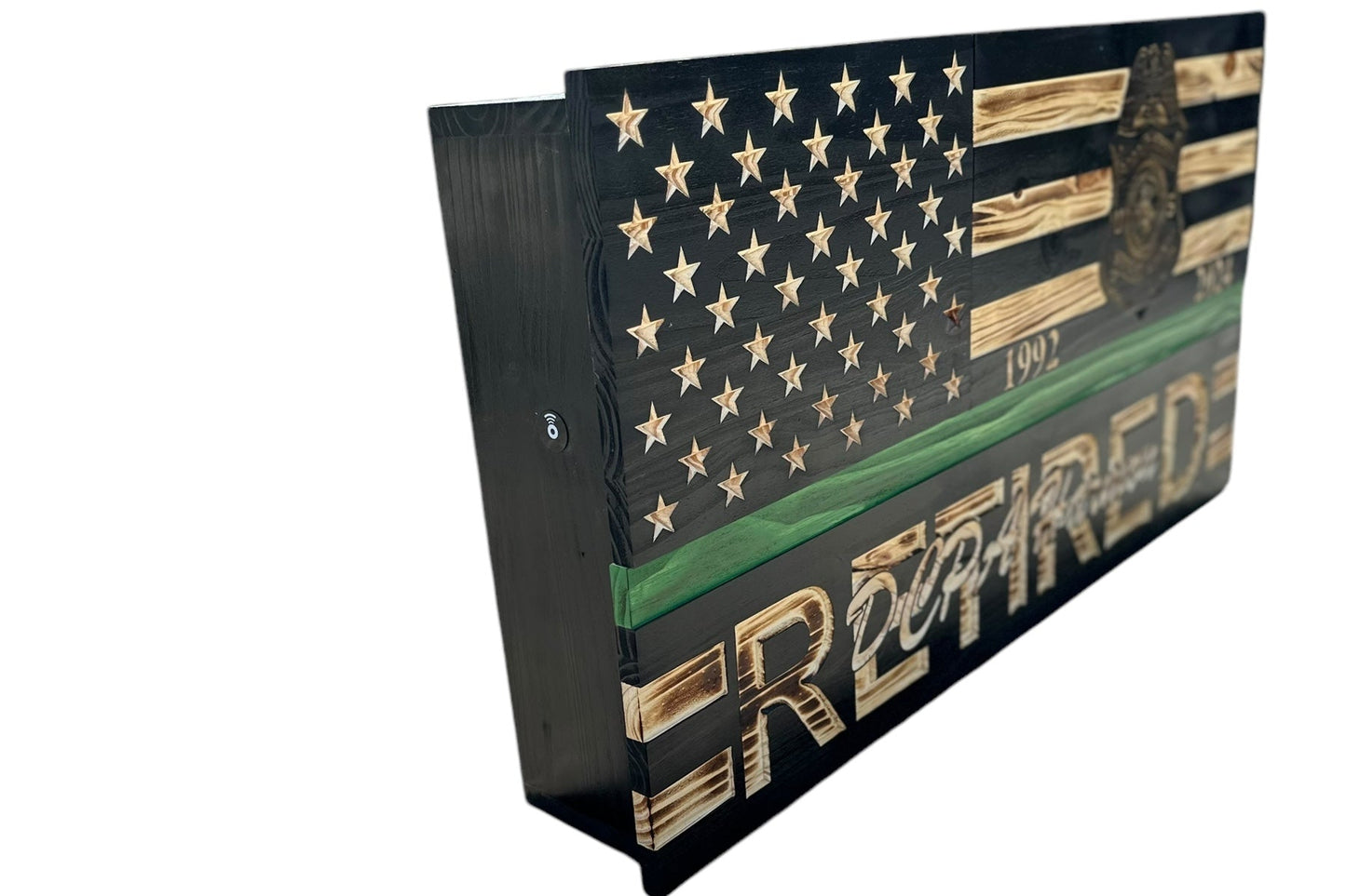 left side view of custom wooden american flag with a concealment compartment andcustom engraved badge and personalization