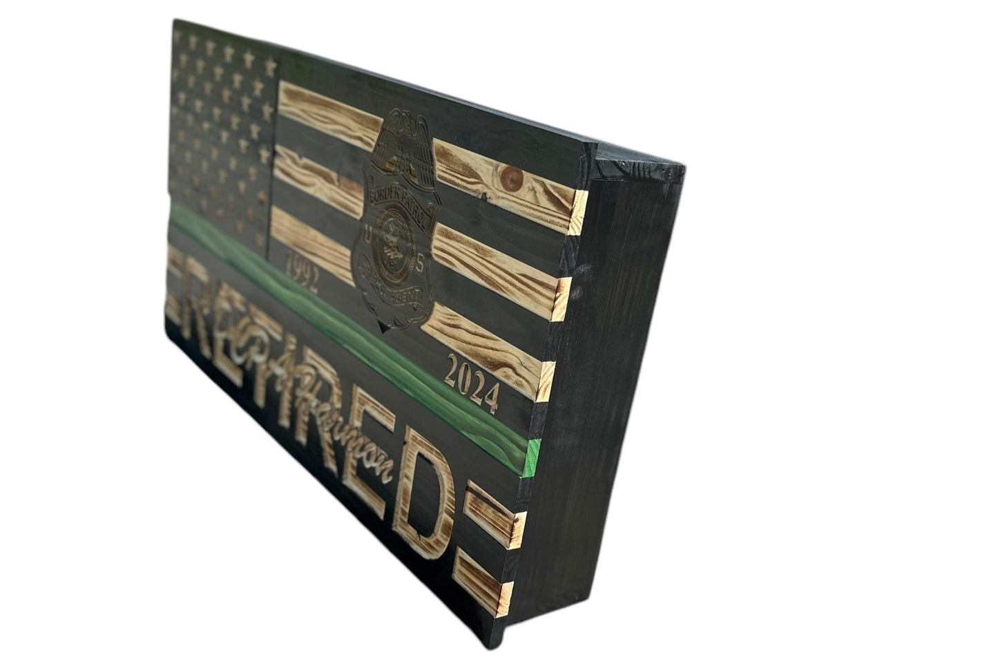 right side view of custom wooden american flag with a concealment compartment custom engraved badge and personalization